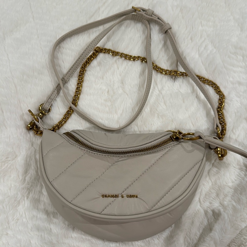 Charles & Kieth Philomena wrinkled-effect Half Moon crossbody bag